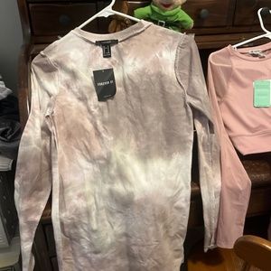 4 items (1) t-shirt dress, (1) workout outfit pink and ( 1) Michael Kors Dress